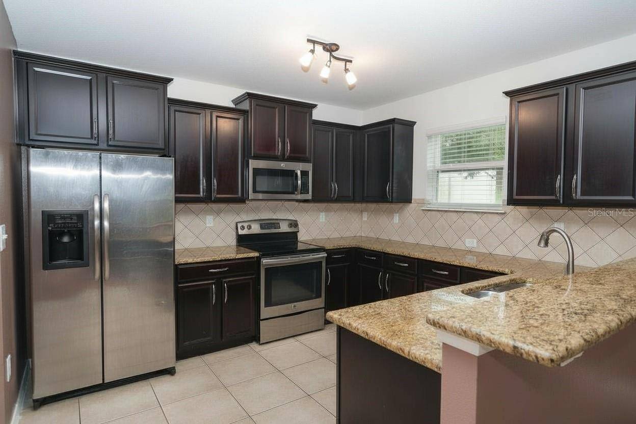 5909 WINDSONG OAK DR, Leesburg, FL 34748