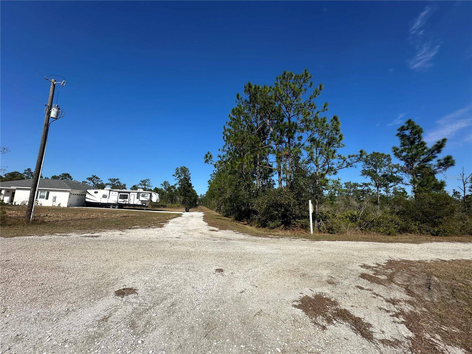 22 BOUGAINVILLE DR, Indian Lake Estates, FL 33855