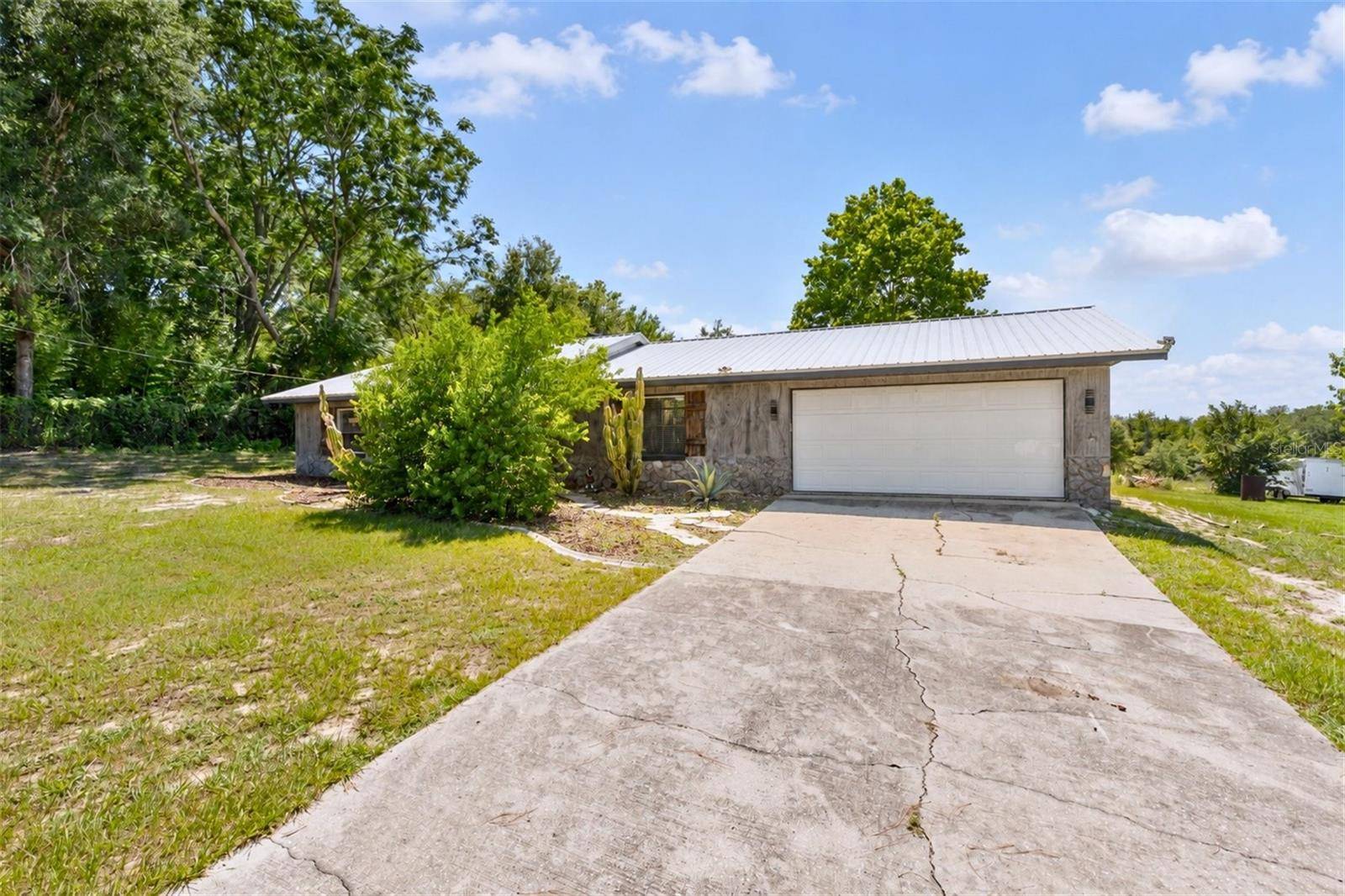 37149 GRAYS AIRPORT RD, Lady Lake, FL 32159