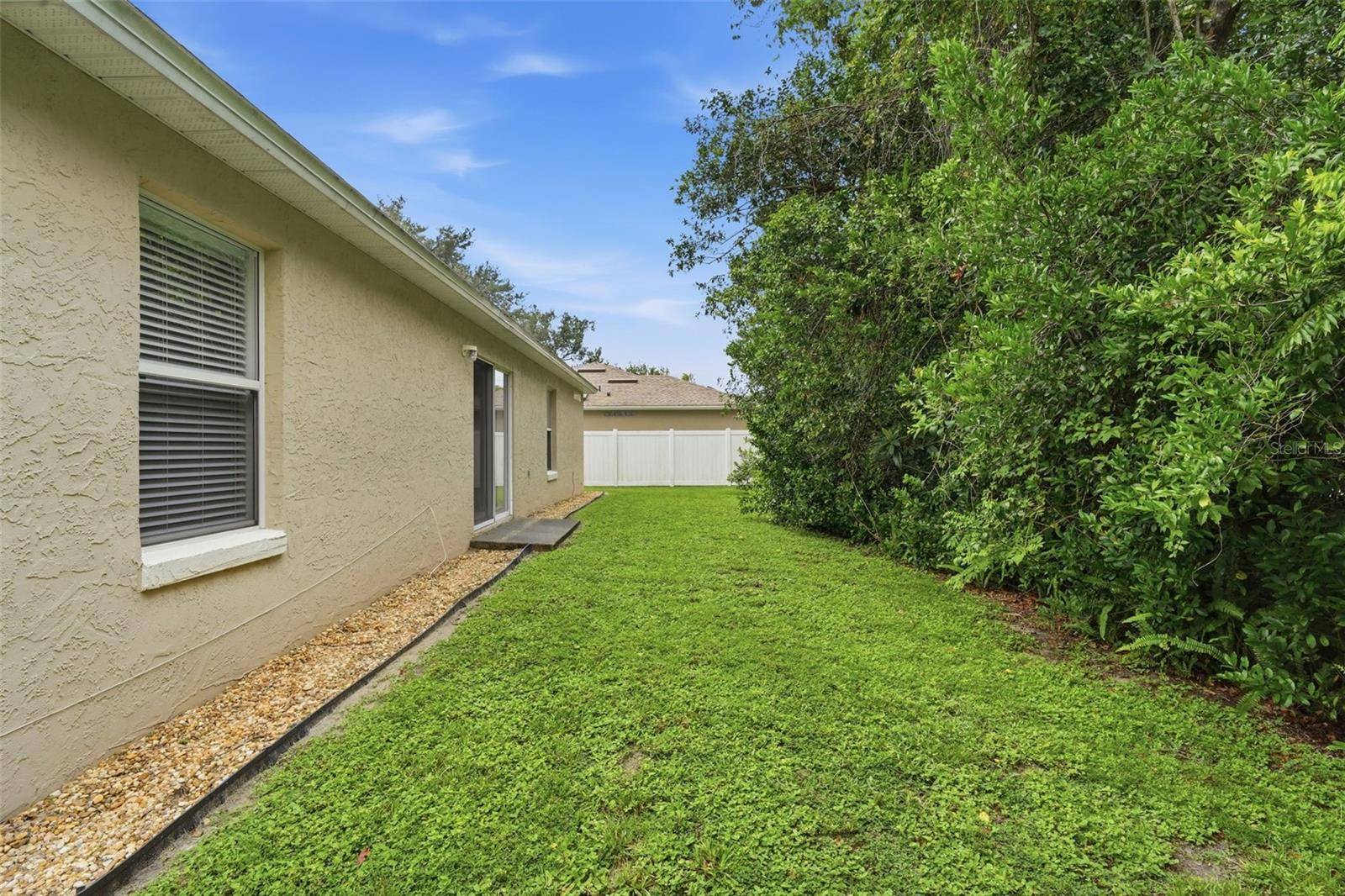 1302 BENTON LAKE DR E, Deland, FL 32724