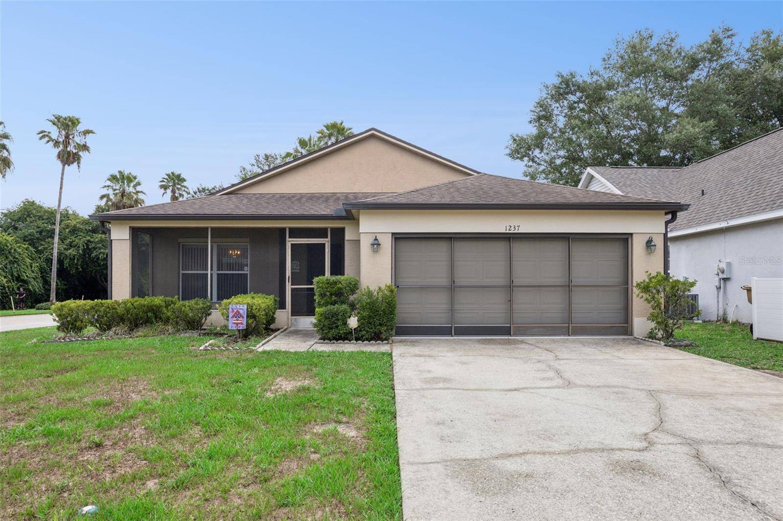 1237 WOODFLOWER WAY, Clermont, FL 34714