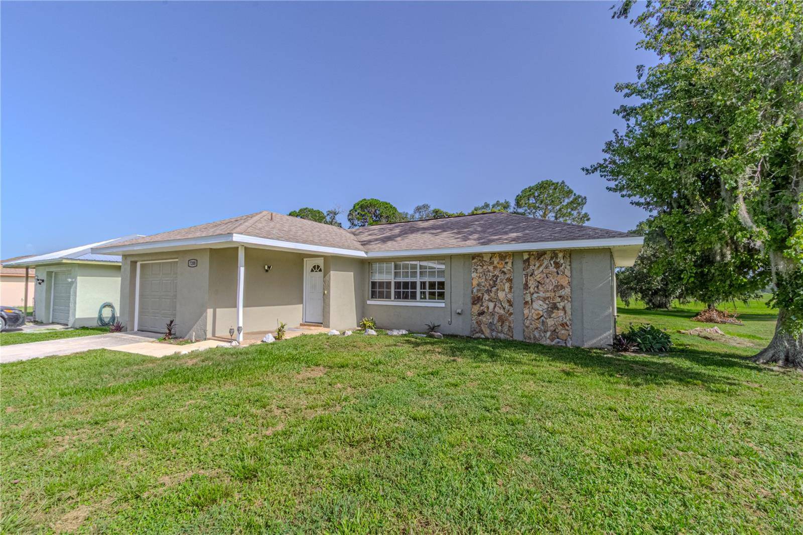 7208 HONEYSUCKLE DR, Sebring, FL 33876