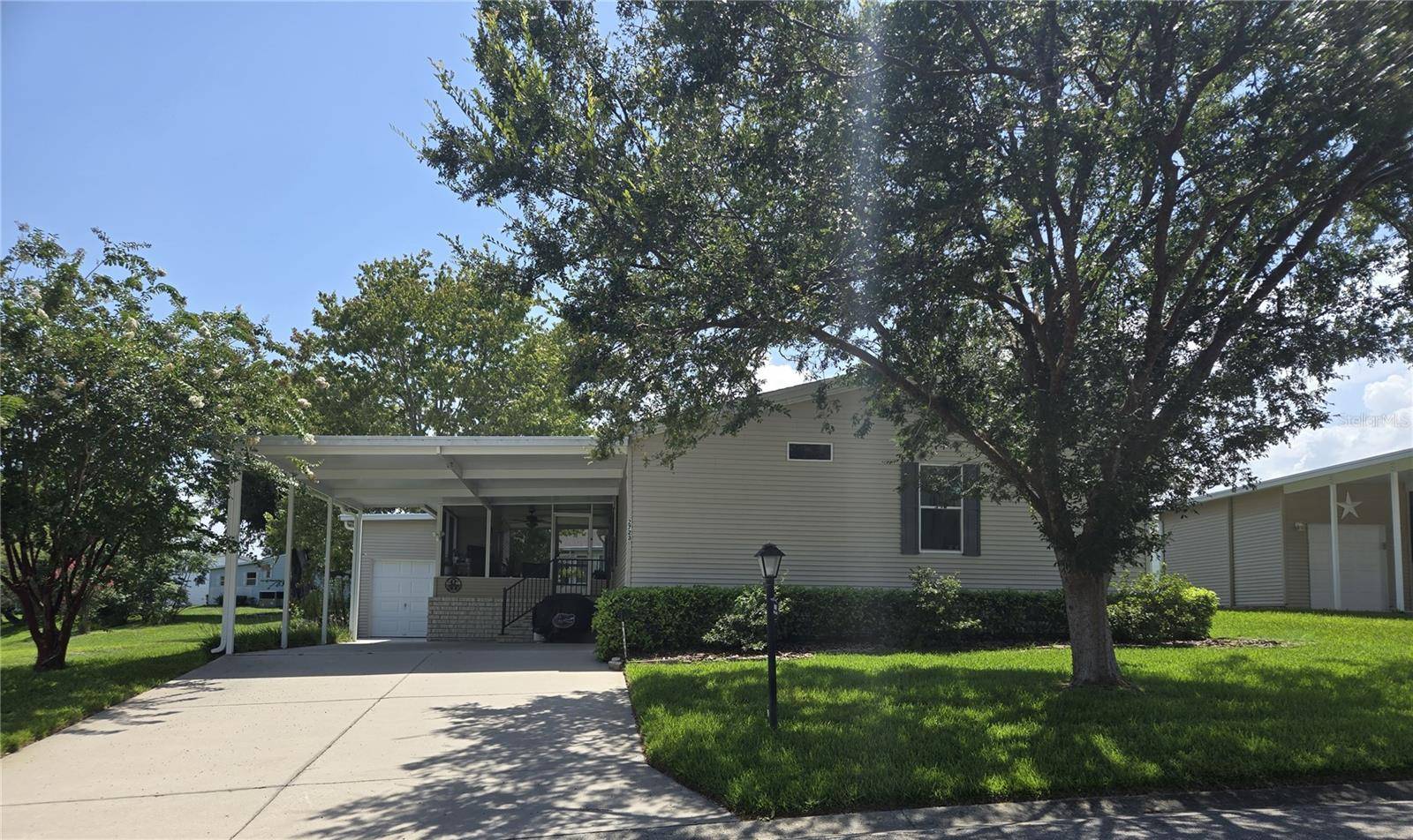 2723 LAKE GRASSMERE CIR #910, Zellwood, FL 32798