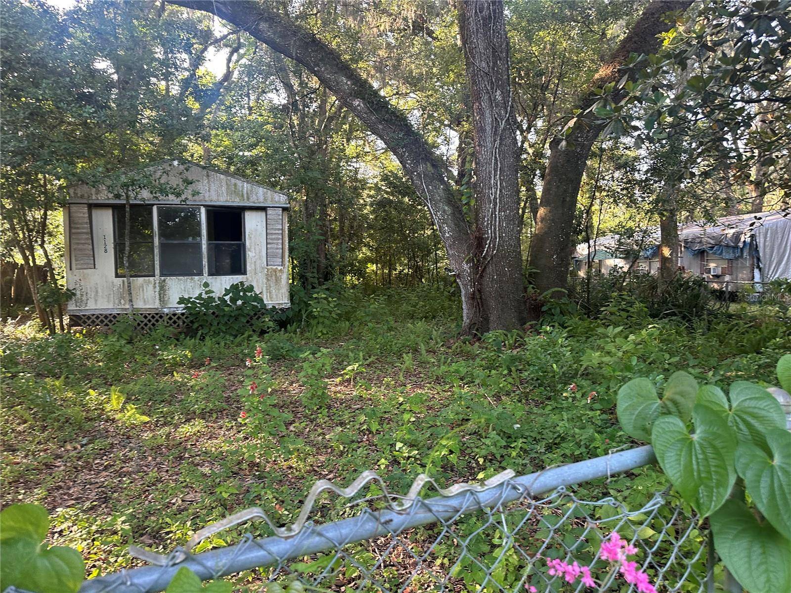 1128 N JACKSON AVE S, Spring Hill, FL 34604