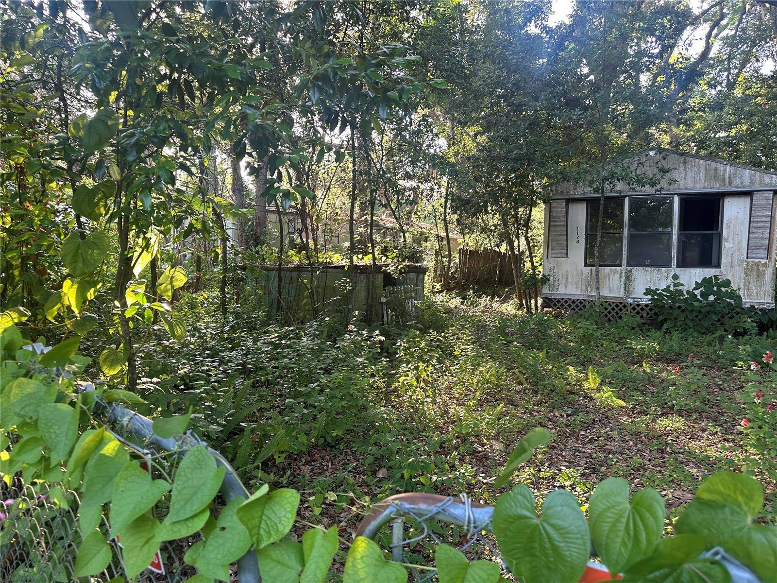 1128 N JACKSON AVE S, Spring Hill, FL 34604