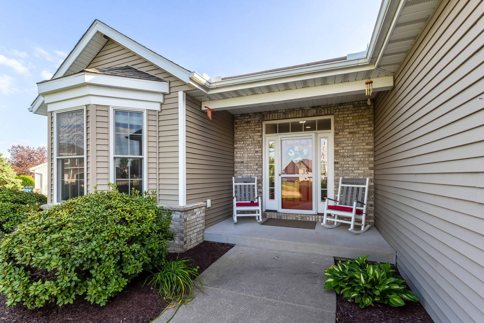 414 Fenceline DR, Blue Grass, IA 52726