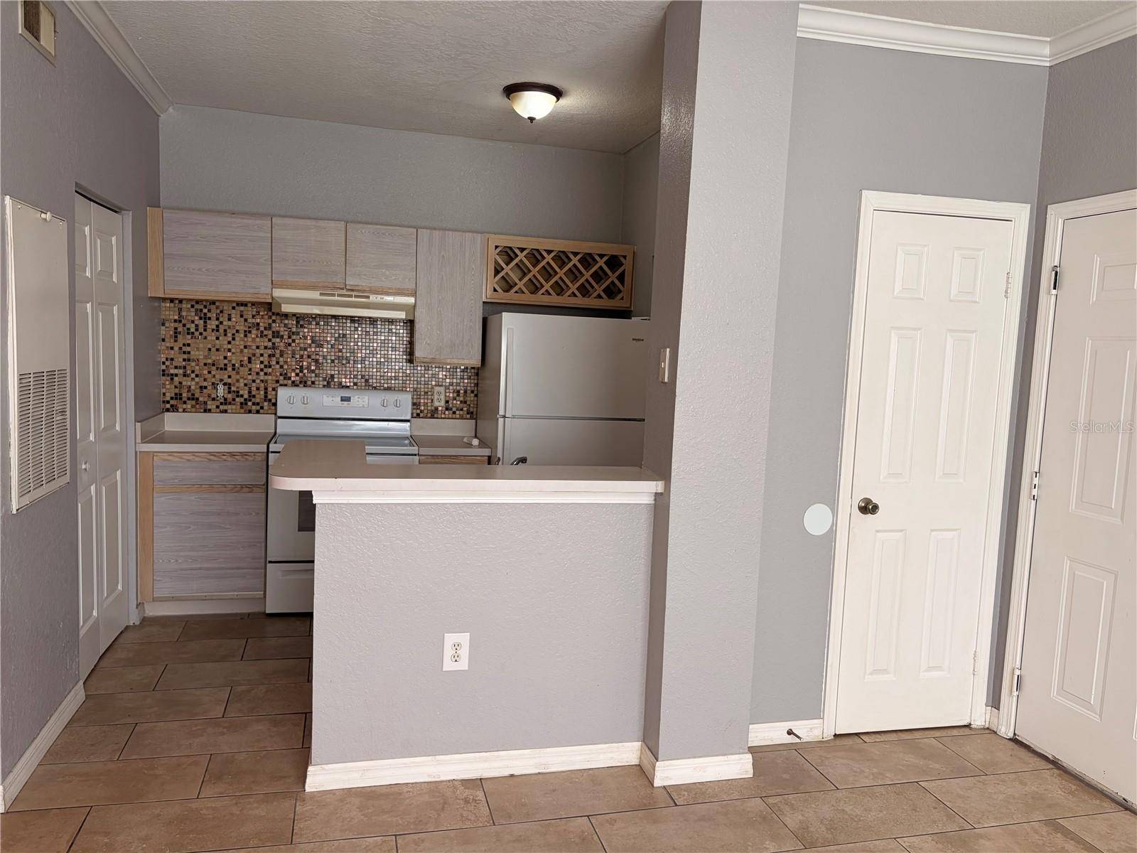 2674 ROBERT TRENT JONES DR #323, Orlando, FL 32835
