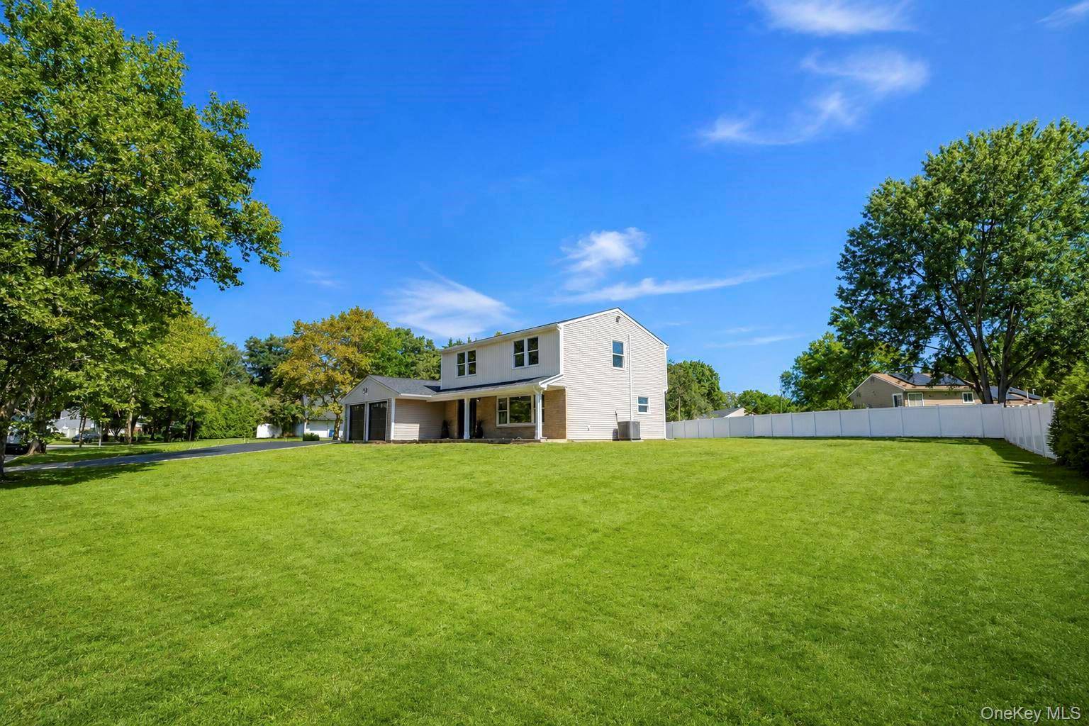 25 Crater Lake DR, Coram, NY 11727