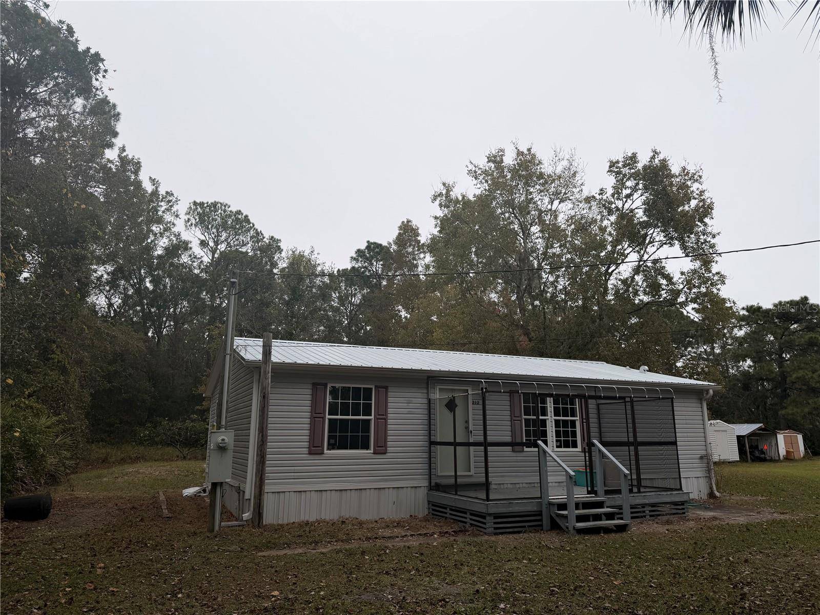 212 PARADISE SHORES RD, Crescent City, FL 32112