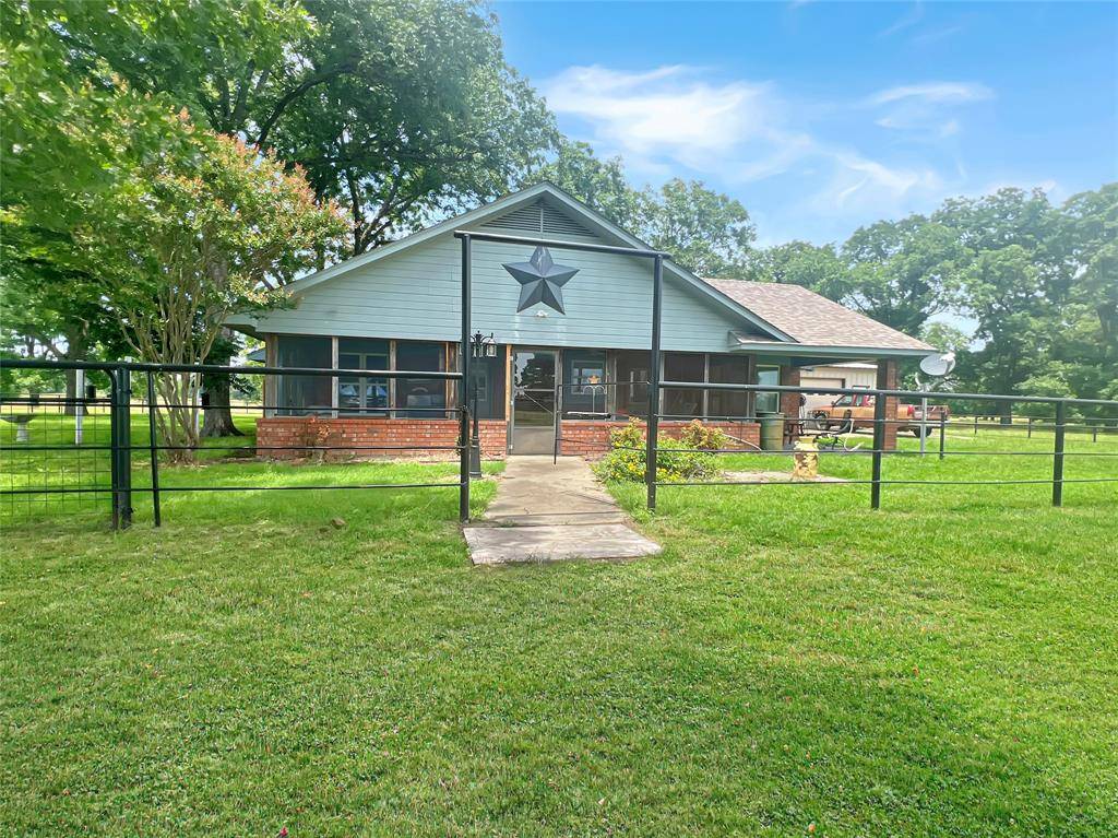 695 County Road 1210, Lake Creek, TX 75450