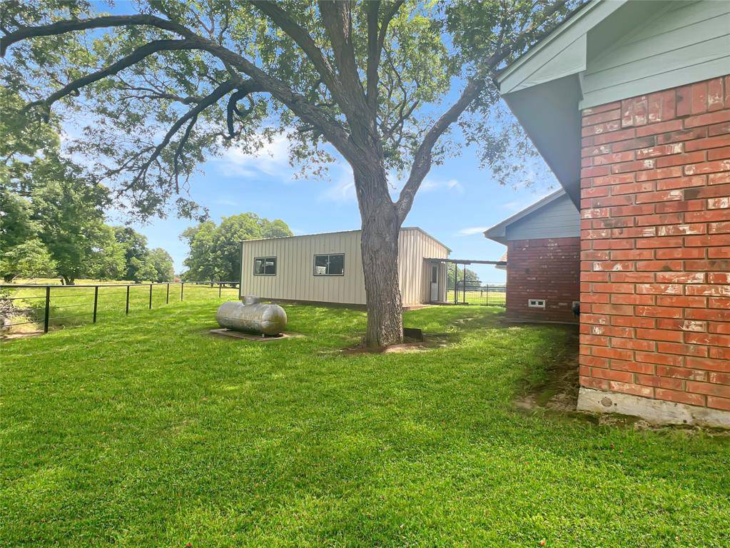 695 County Road 1210, Lake Creek, TX 75450