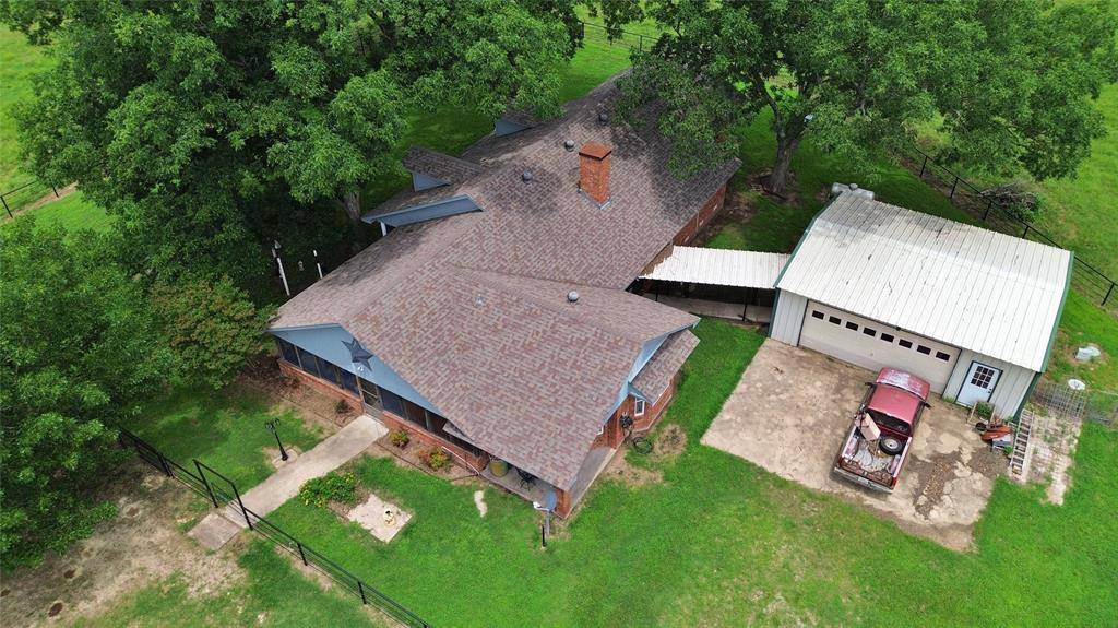 695 County Road 1210, Lake Creek, TX 75450