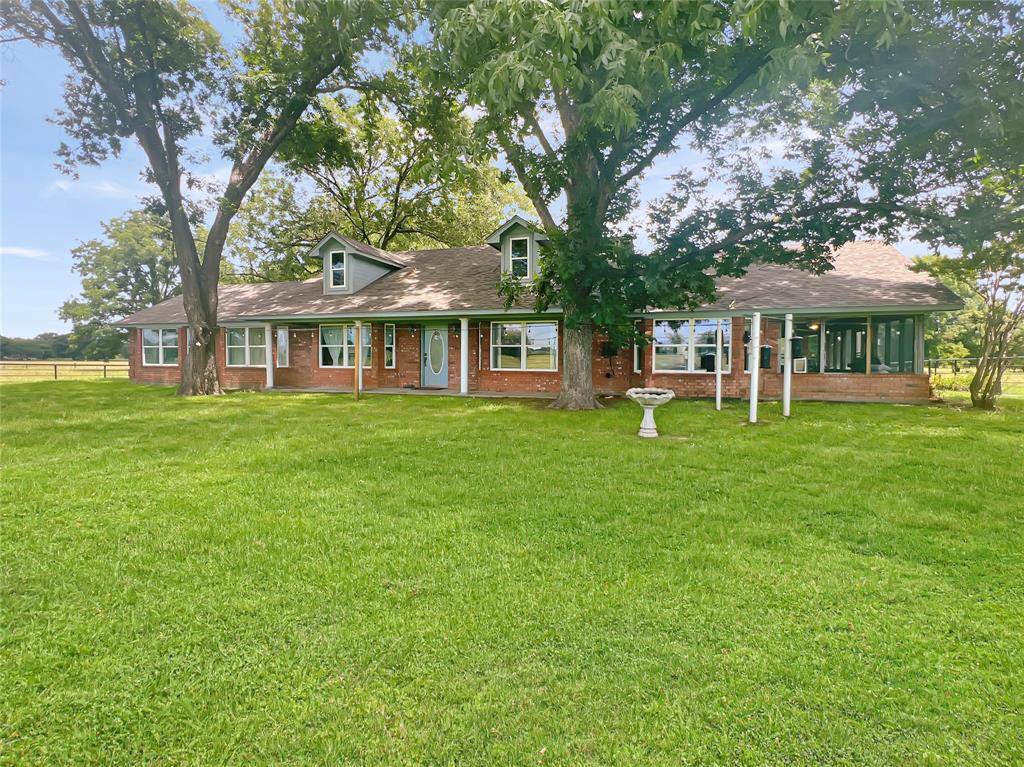 695 County Road 1210, Lake Creek, TX 75450