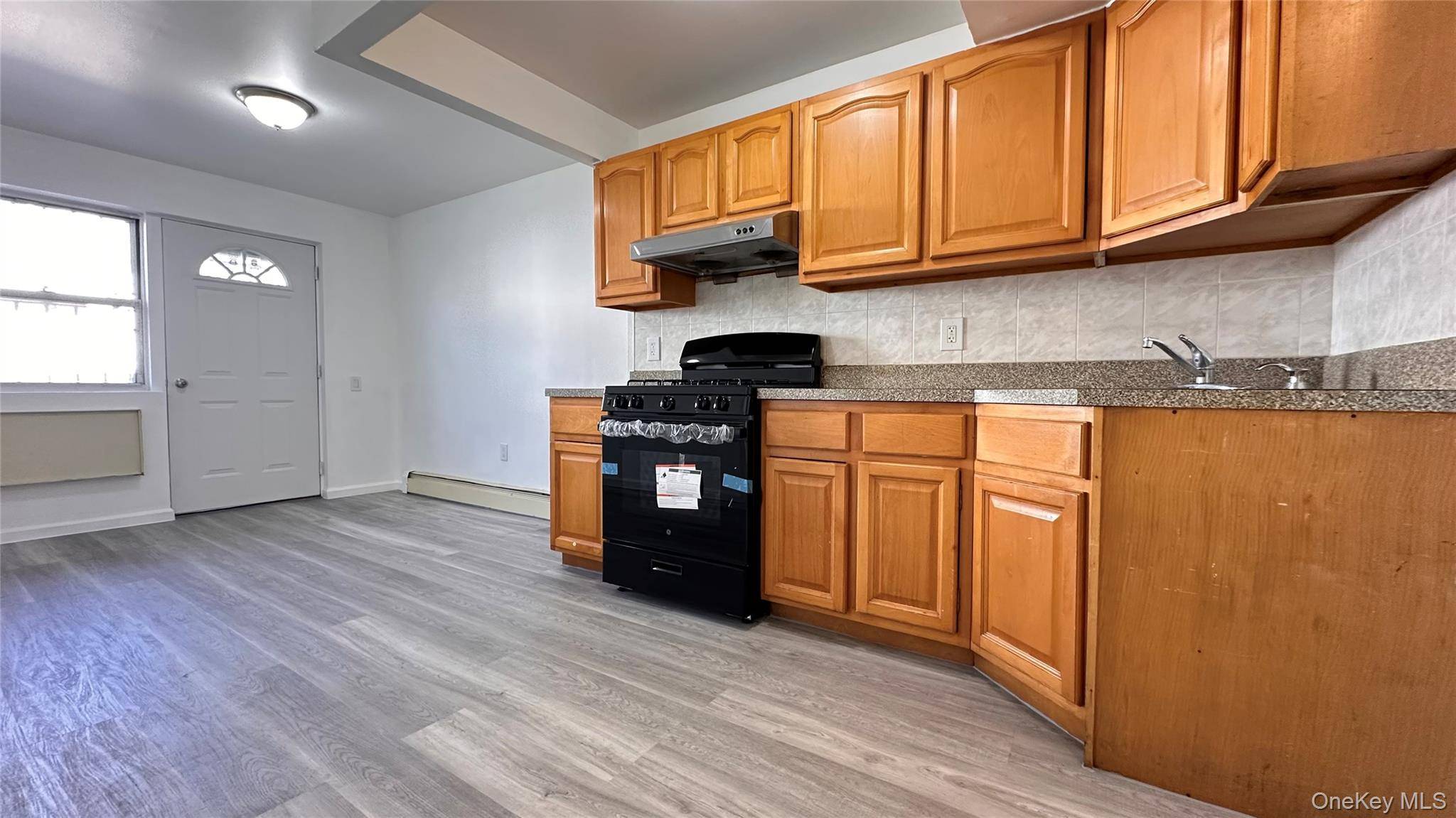 111-21 44th AVE, Corona, NY 11368