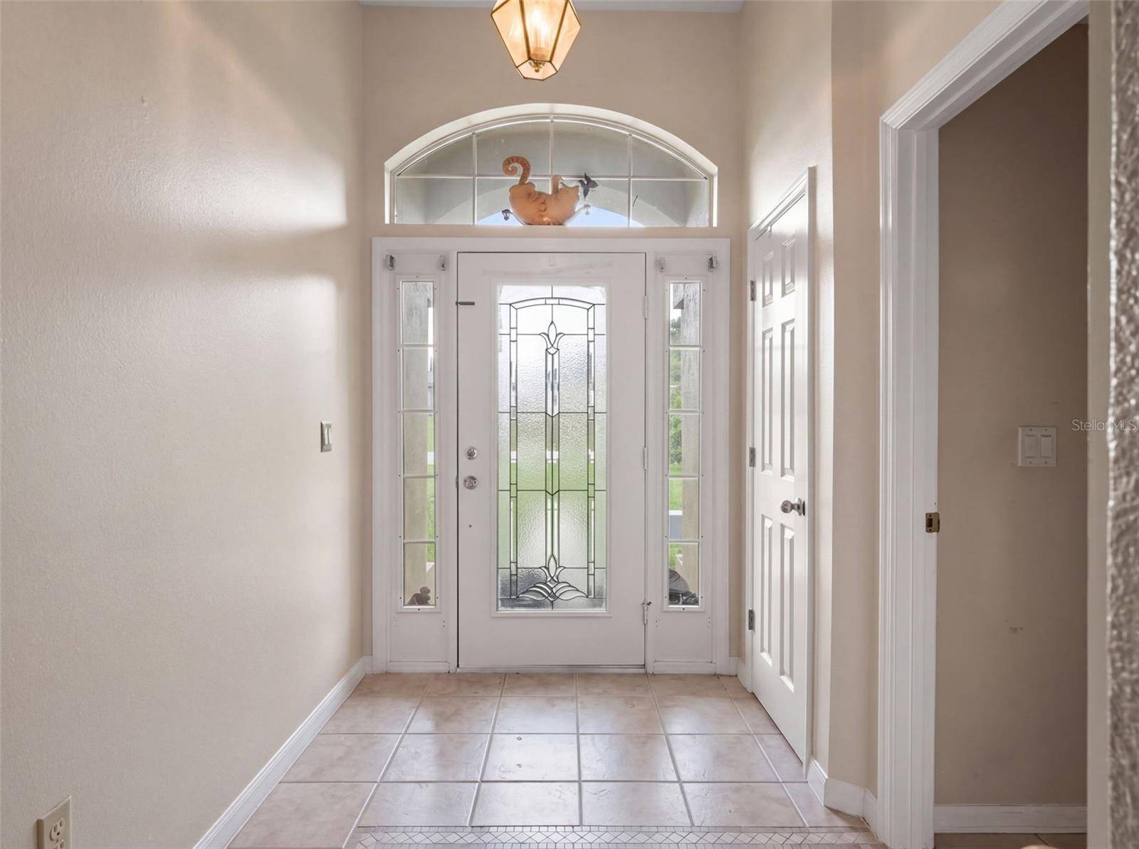 8014 CARDINAL WINDS LN, Mascotte, FL 34753