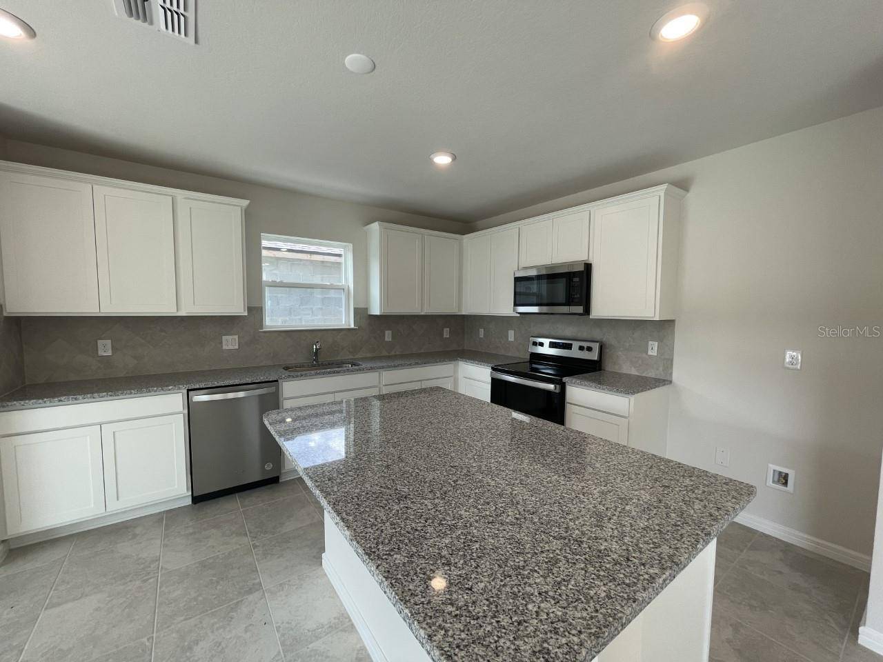 9469 RALLY SPRING LOOP, Wesley Chapel, FL 33545