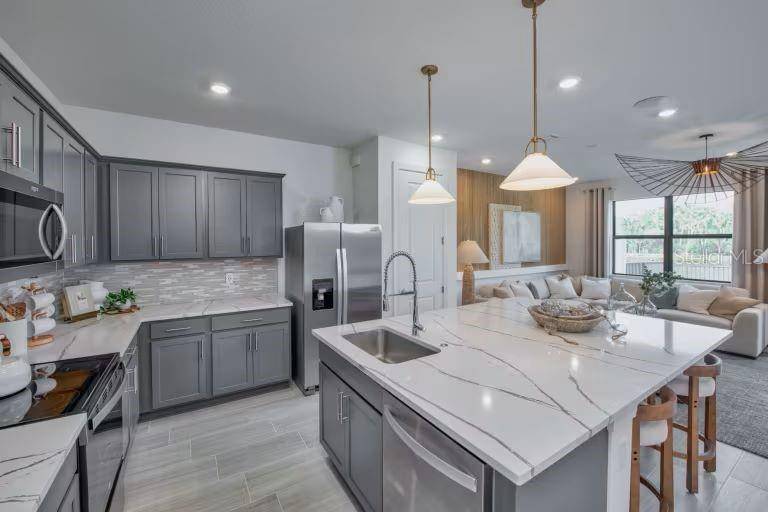 6831 BRAHMAN GRAZE CT, Wesley Chapel, FL 33545