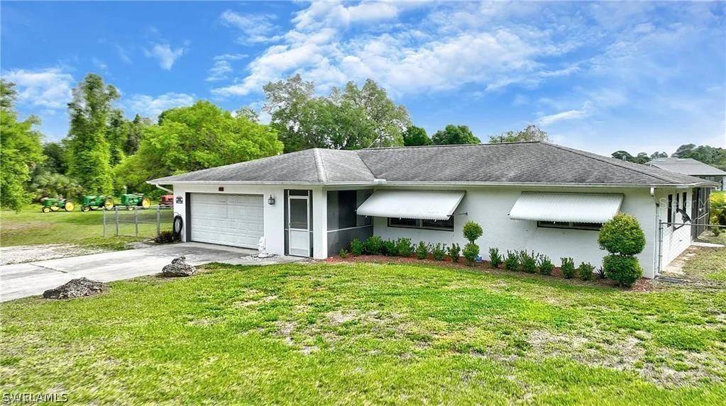 704 CLEVELAND AVE, Lehigh Acres, FL 33972