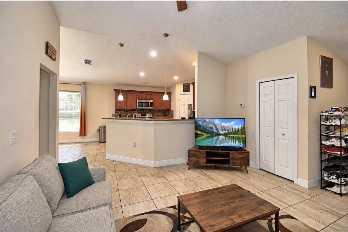 2128 ORCHID WAY, Poinciana, FL 34759