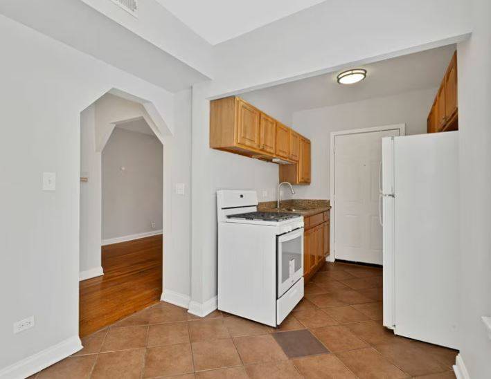 7150-52 S Cornell AVE, Chicago, IL 60649