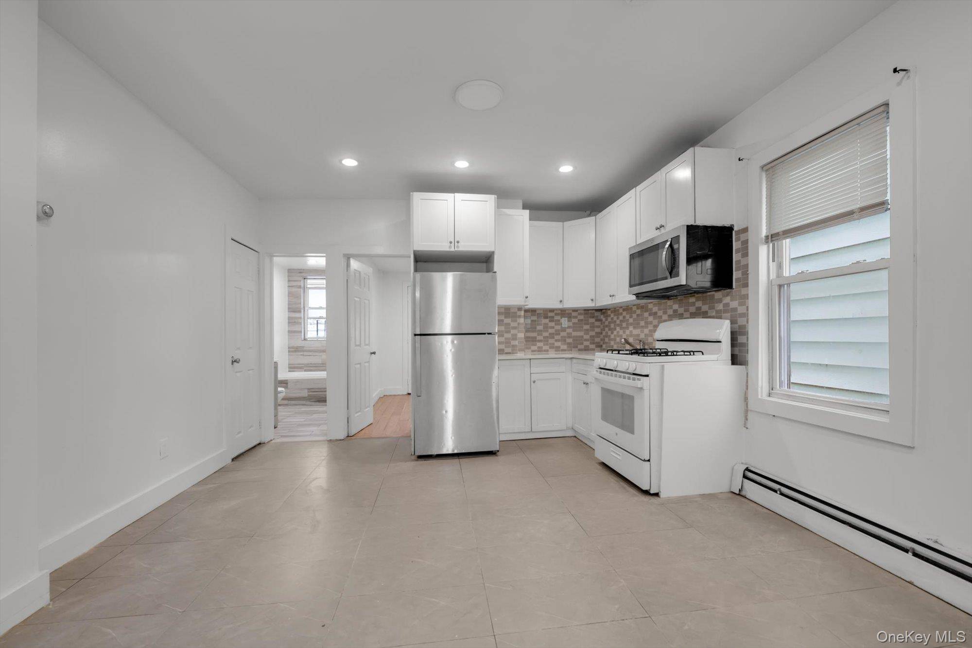 32-46 105 St, Corona, NY 11369