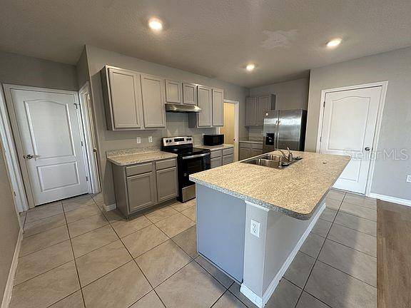 1448 BERRY LN, Davenport, FL 33837