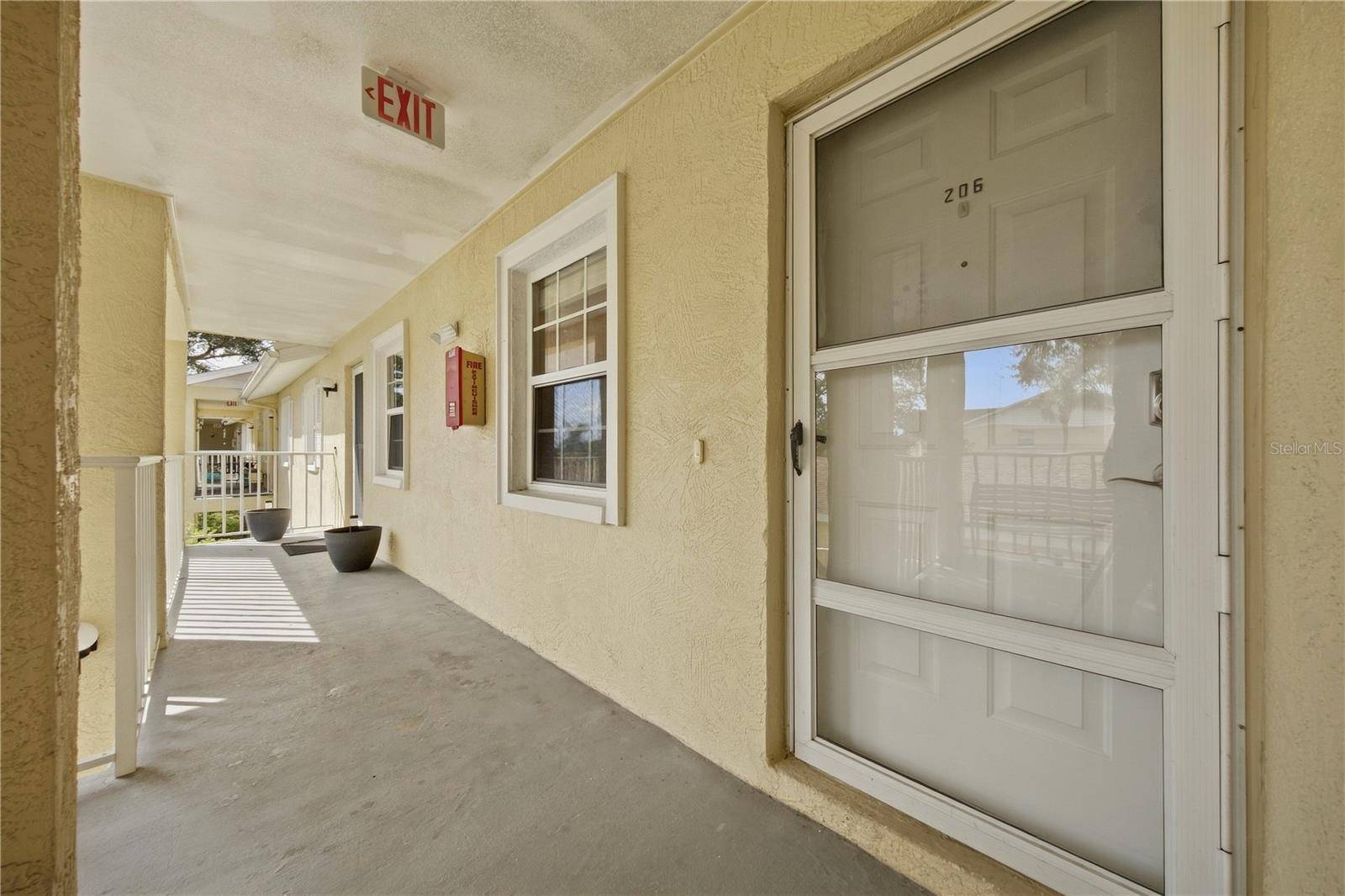 1408 MILLSTREAM LN #206, Dunedin, FL 34698