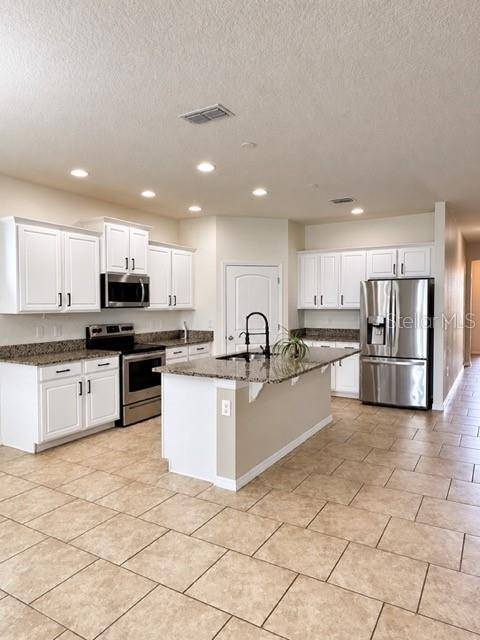 1437 TAWNY RIDGE RD, Kissimmee, FL 34744