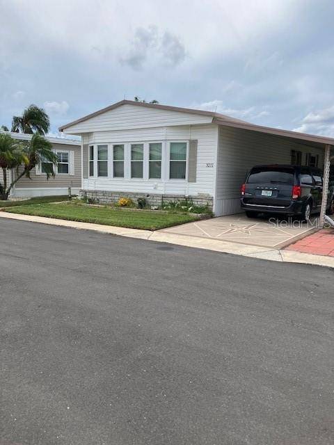 3211 SOUTHPORT DR, Holiday, FL 34690