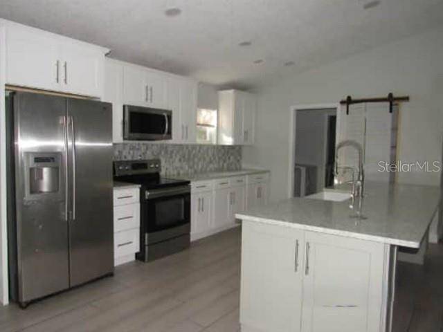 1009 FORT SMITH BLVD, Deltona, FL 32725