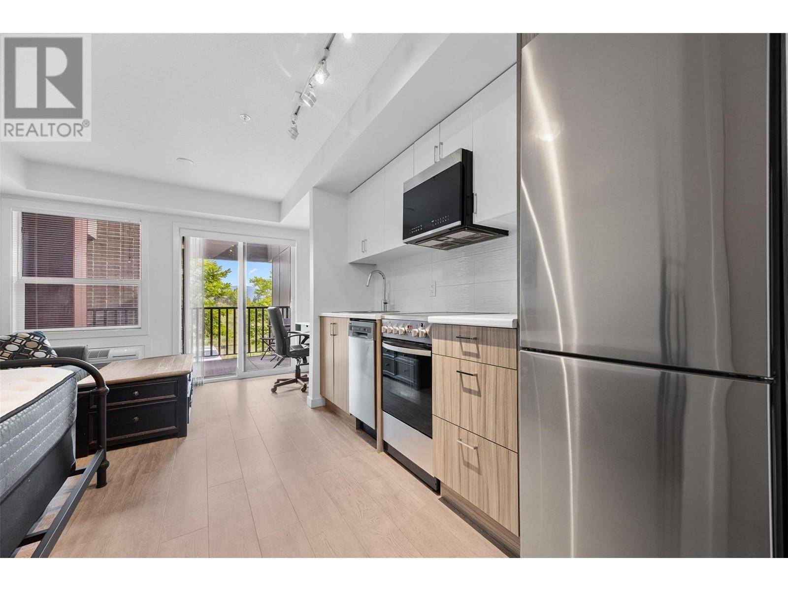 Kelowna, BC V1V0E3,625 Academy WAY #103