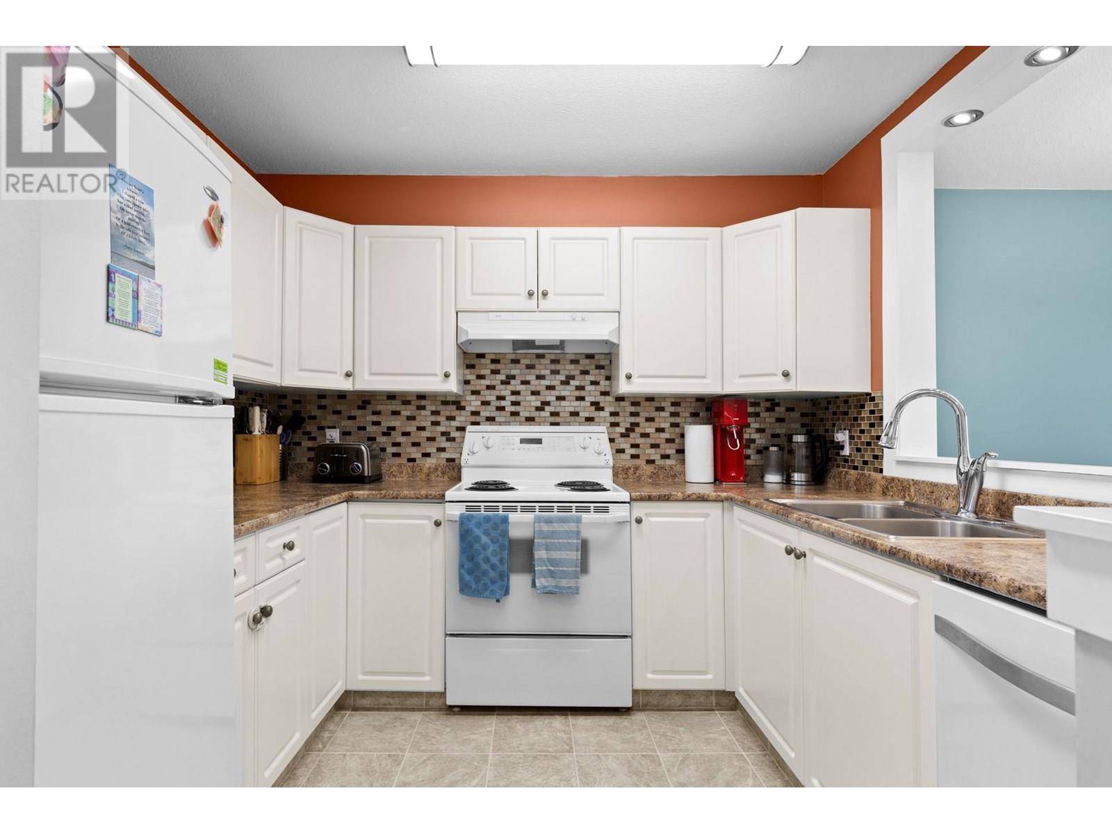 Kelowna, BC V1Y1Y3,400 Sutton CRES #209