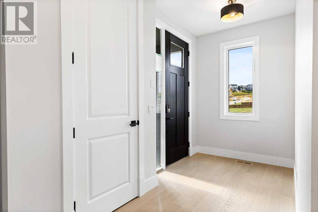 Calgary, AB T2X5G6,209 Creekstone Hill SW