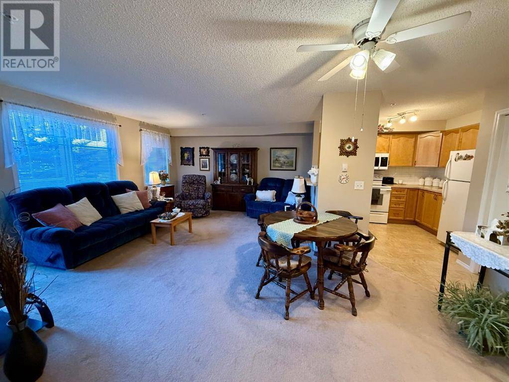 Okotoks, AB T1S2L2,2216, 200 Community