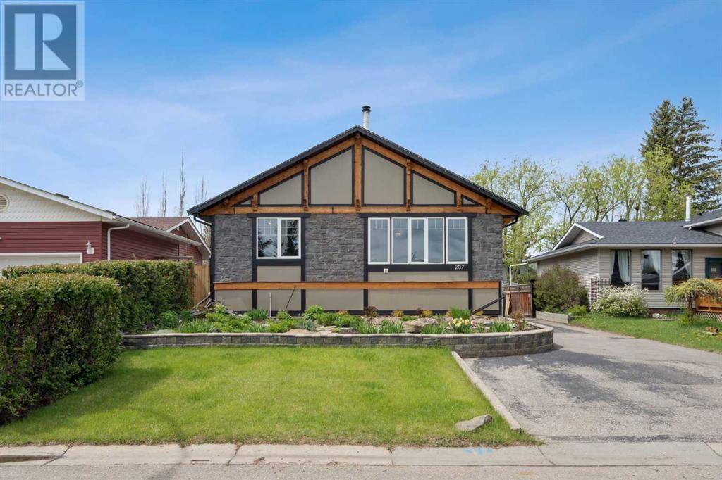 Okotoks, AB T1S1E3,207 Woodrow Place