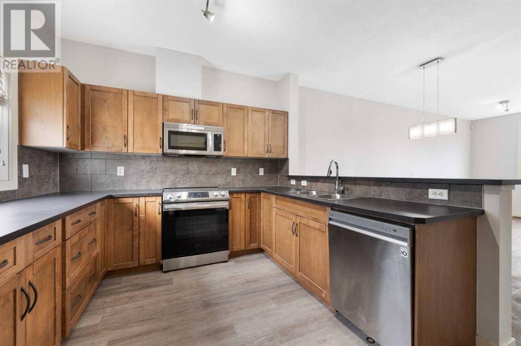 Calgary, AB T3H0J4,1403, 281 Cougar Ridge Drive SW