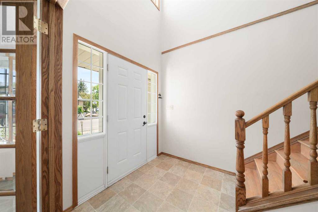 Okotoks, AB T1S1L8,173 Woodhaven Drive
