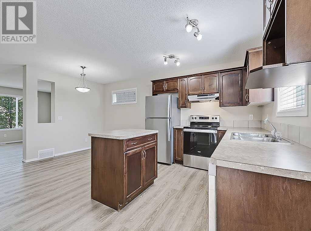 Okotoks, AB T1S0J6,483 Cimarron Boulevard
