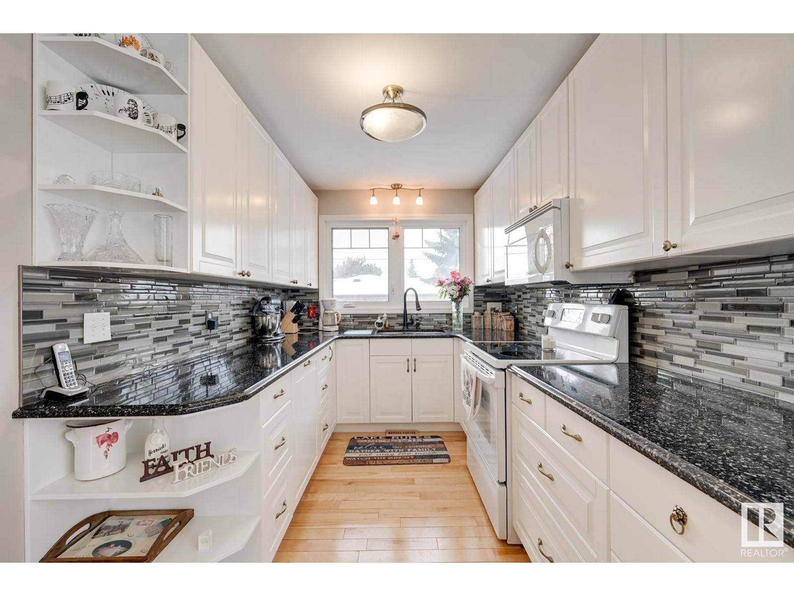 Edmonton, AB T5C2B8,7047 132A AV NW