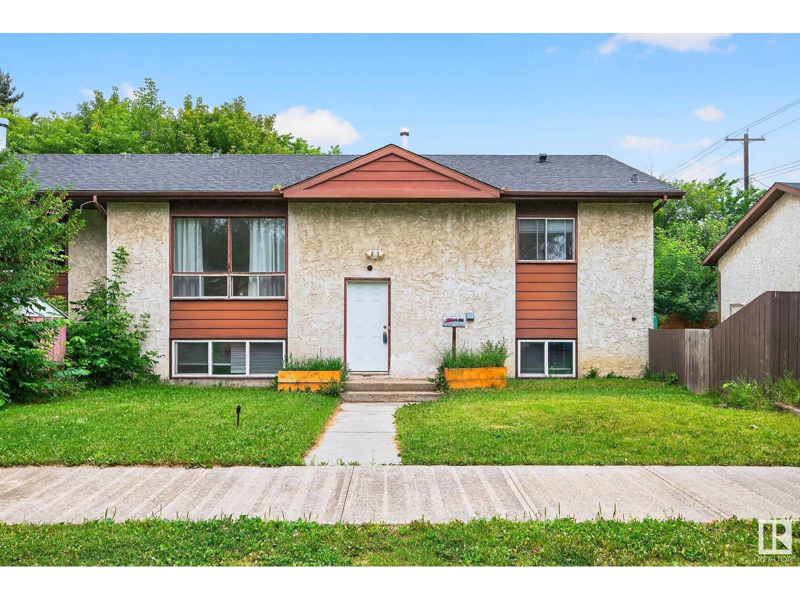 Edmonton, AB T5M2S9,12414 112 AV NW