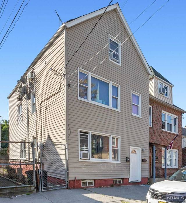 Passaic, NJ 07055,23 Tulip Street