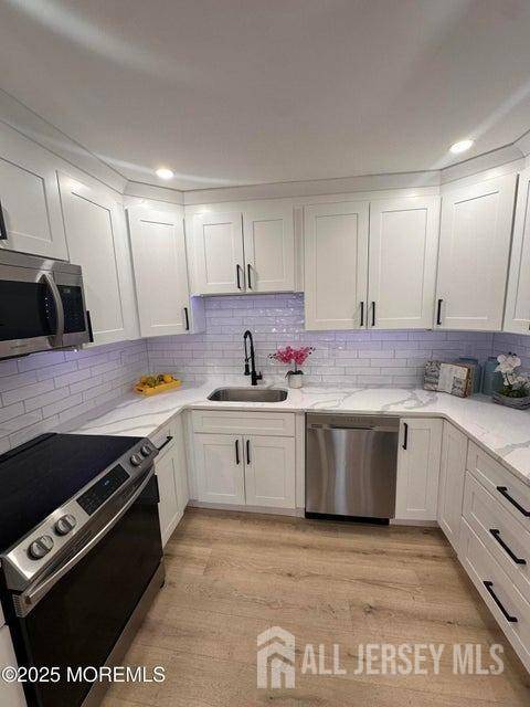 Manalapan, NJ 07726,105 Amberly DR #D