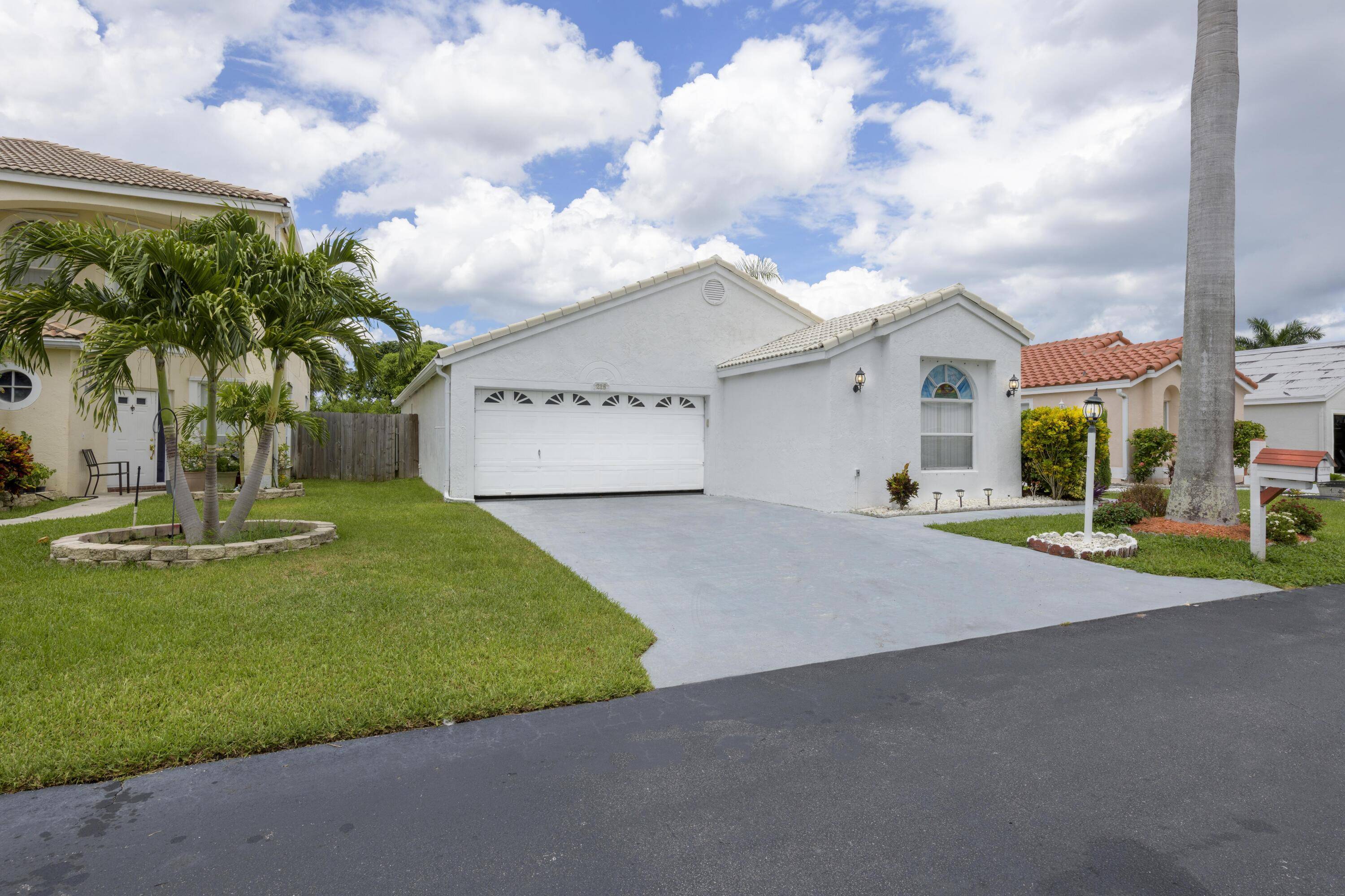 Greenacres, FL 33463,215 Wedgewood CIR