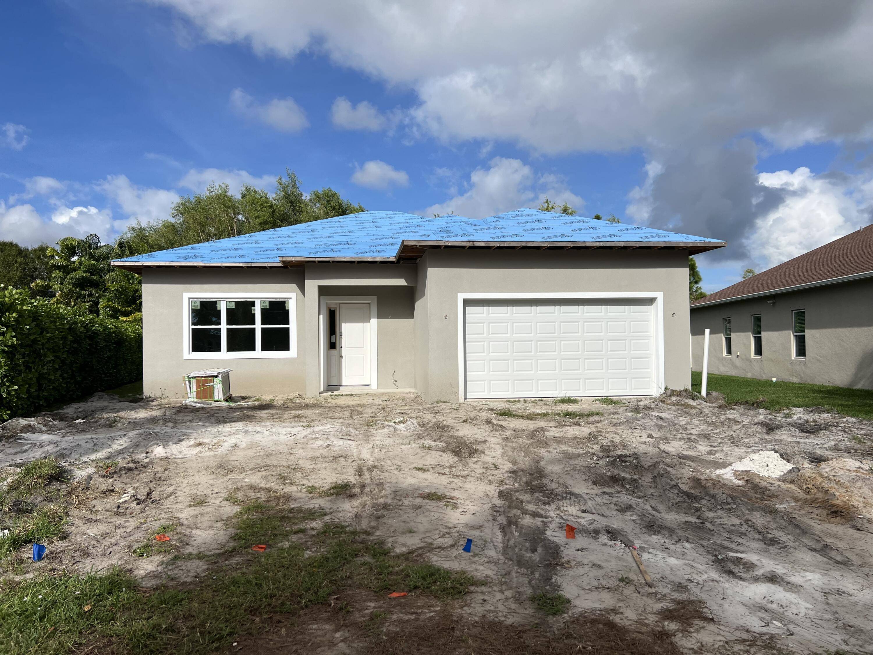 Port Saint Lucie, FL 34983,675 NE Moss Rose PL