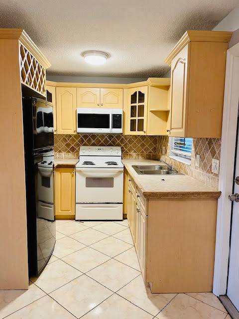 Deerfield Beach, FL 33064,4491 NW 1st TER