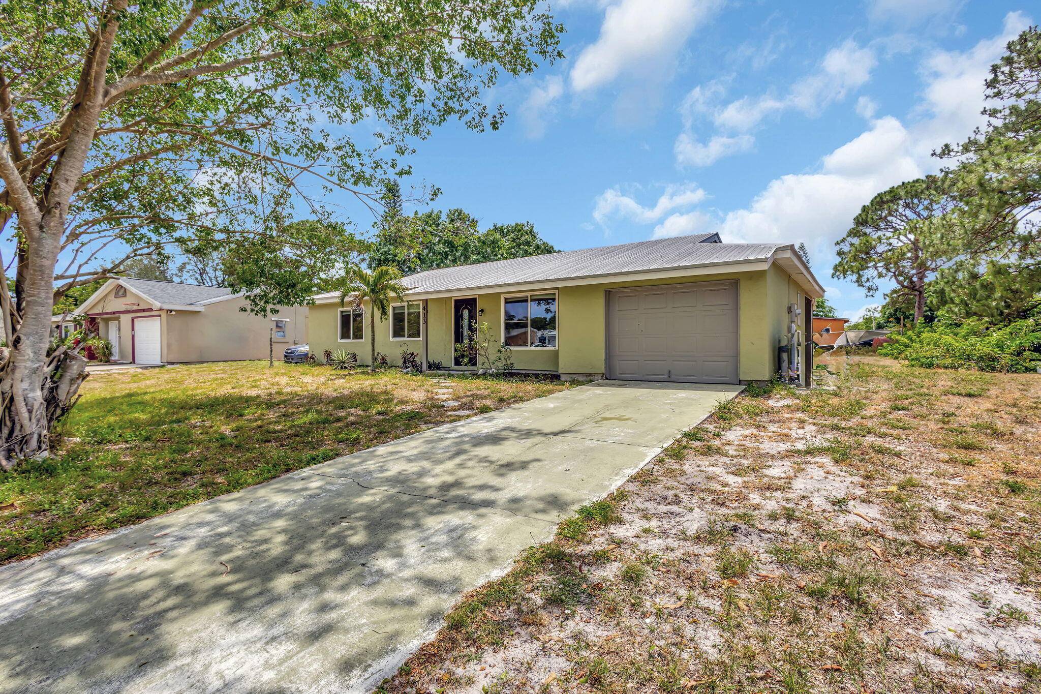 Port Saint Lucie, FL 34953,413 SW Kentwood RD