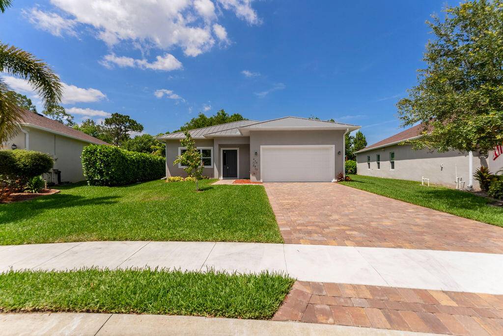 Port Saint Lucie, FL 34983,675 NE Moss Rose PL