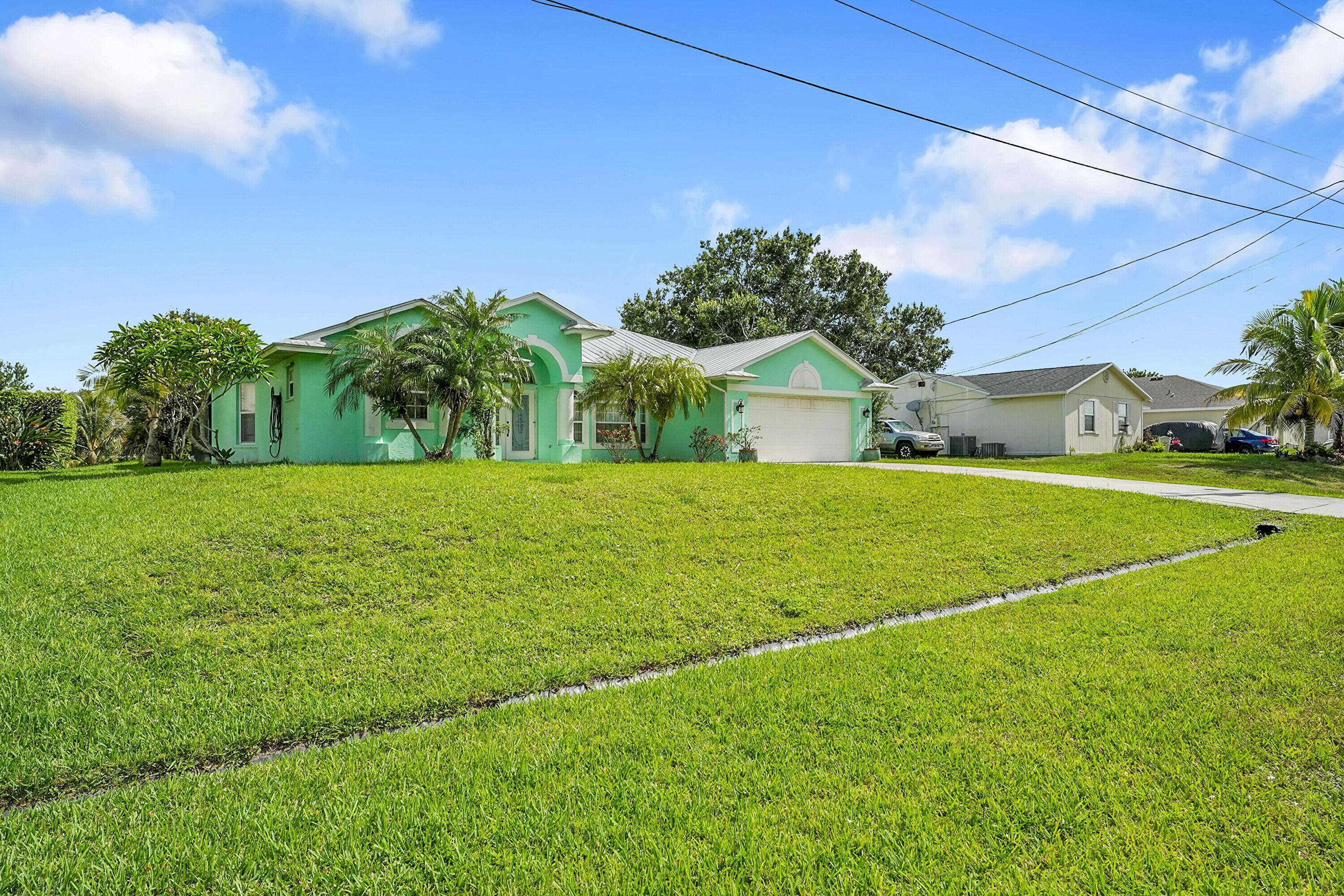 Port Saint Lucie, FL 34953,385 SW North Quick CIR