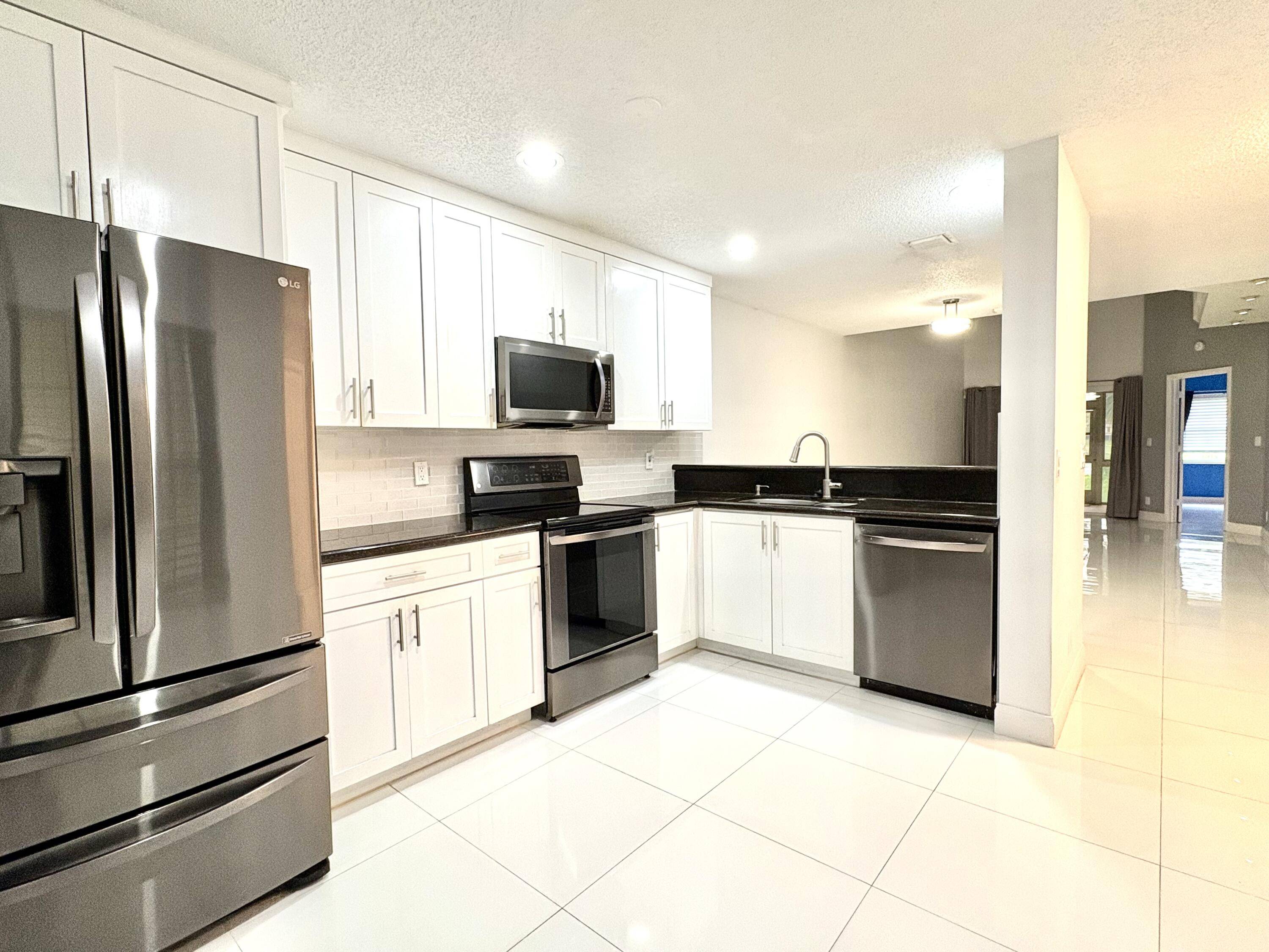 Greenacres, FL 33415,1704 Maplewood DR