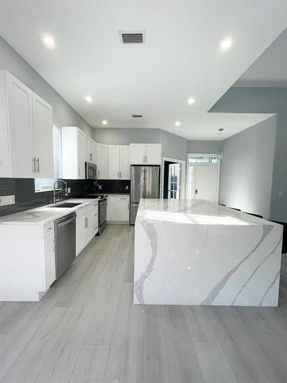 Port Saint Lucie, FL 34986,304 NW Bentley CIR